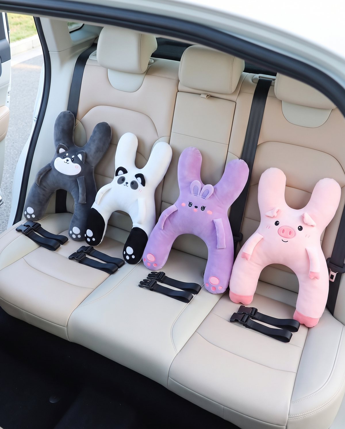 All four Kudlee characters: charcoal husky, white panda, purple bunny and pink pig