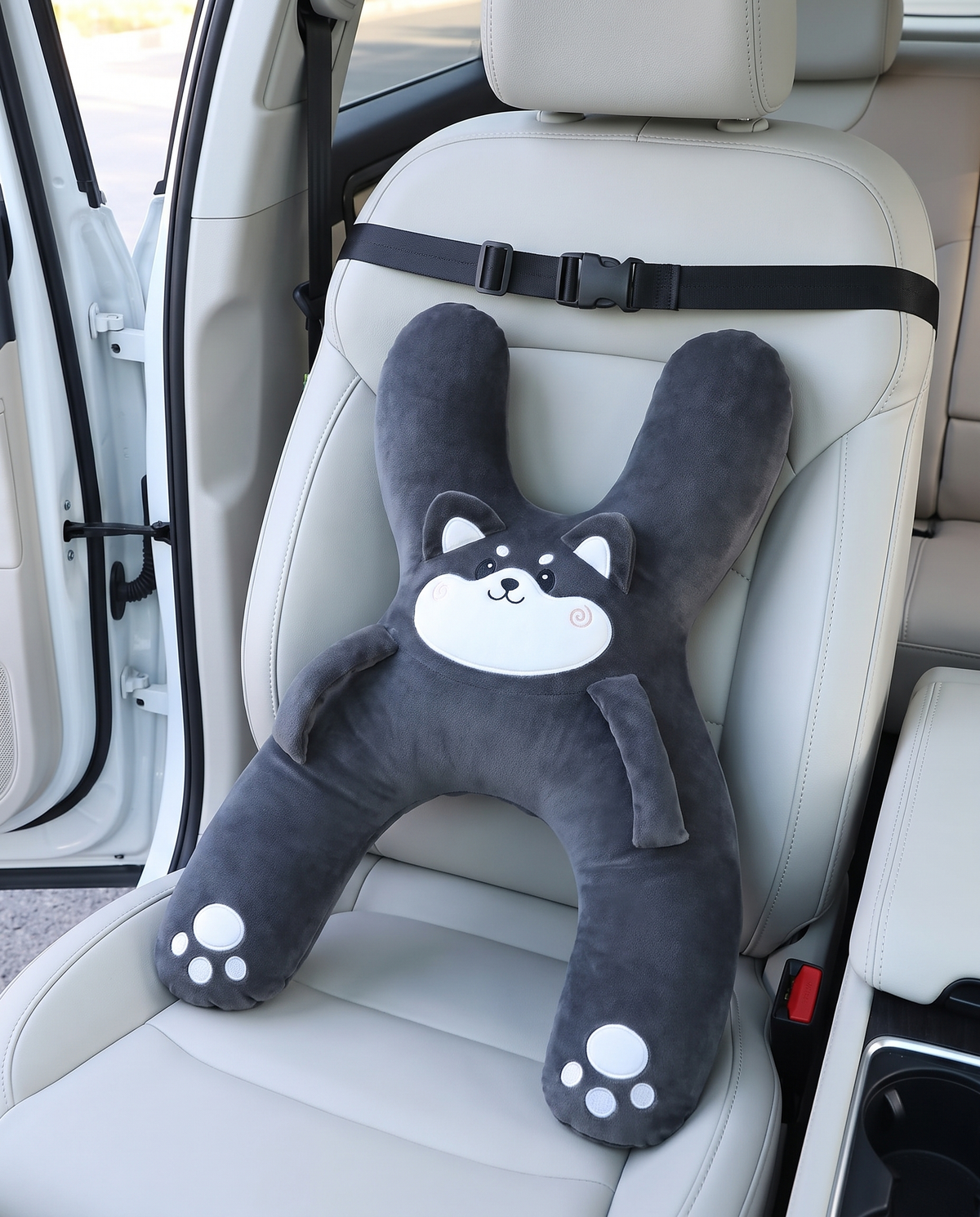 Kudlee charcoal husky pillow laid flat showing both wings, arm openings and buckle strap