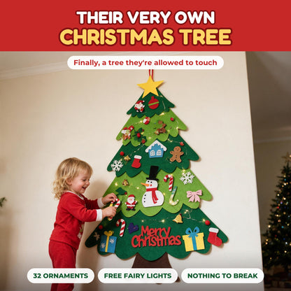 Merrytot felt Christmas tree with fairy lights and a toddler decorating it